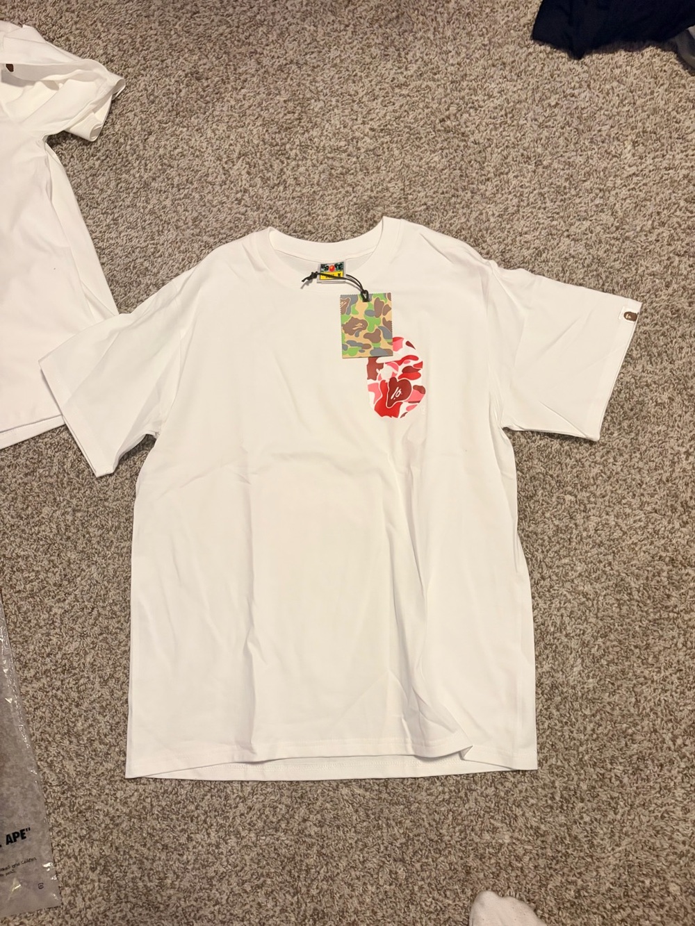 Bape White Short Sleeve Tee with Red Camo Pocket Graphic